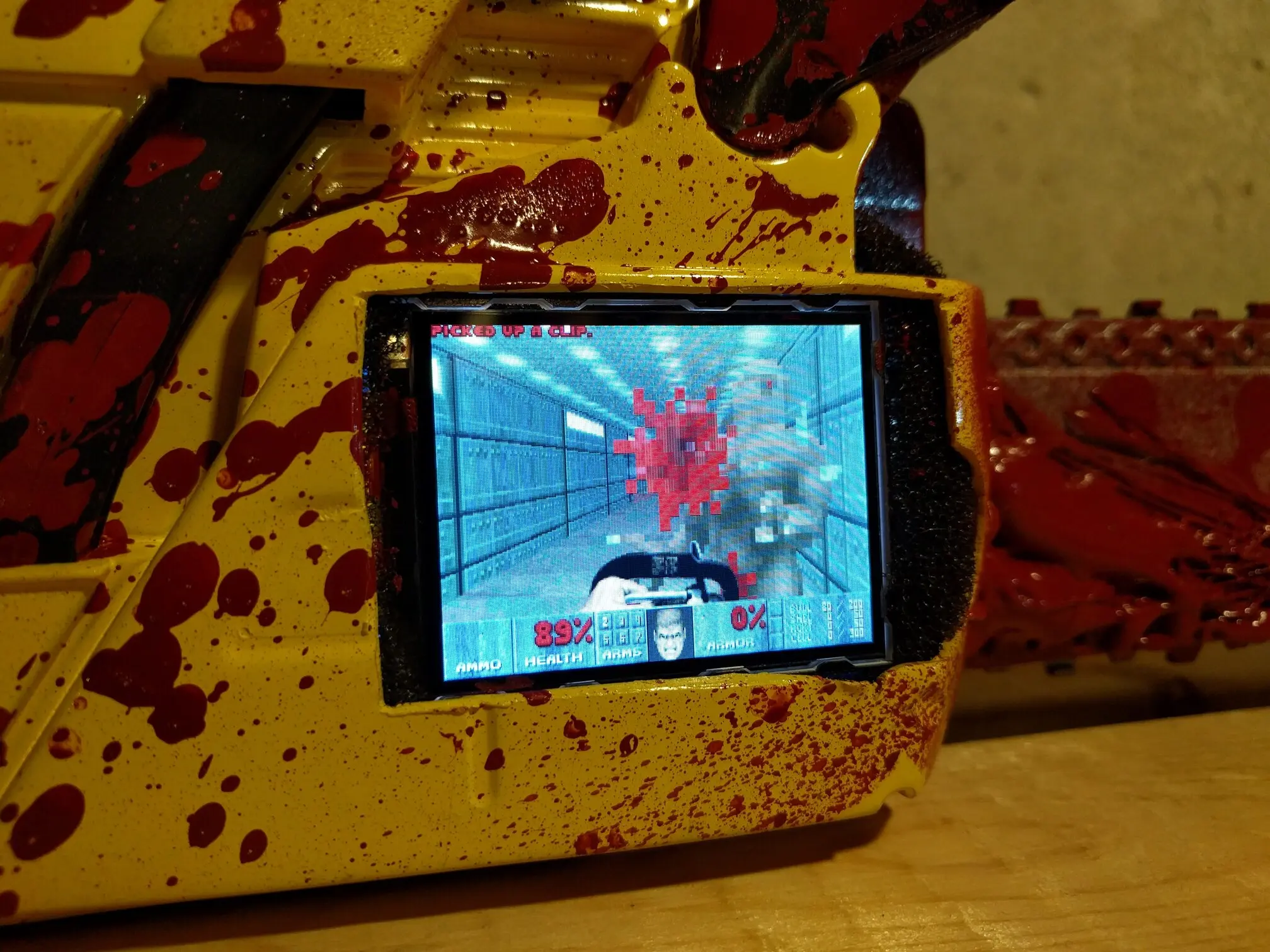 Pi Zero Painsaw - A Raspberry Pi Zero toy chainsaw that runs DooM Pi Zero Painsaw
